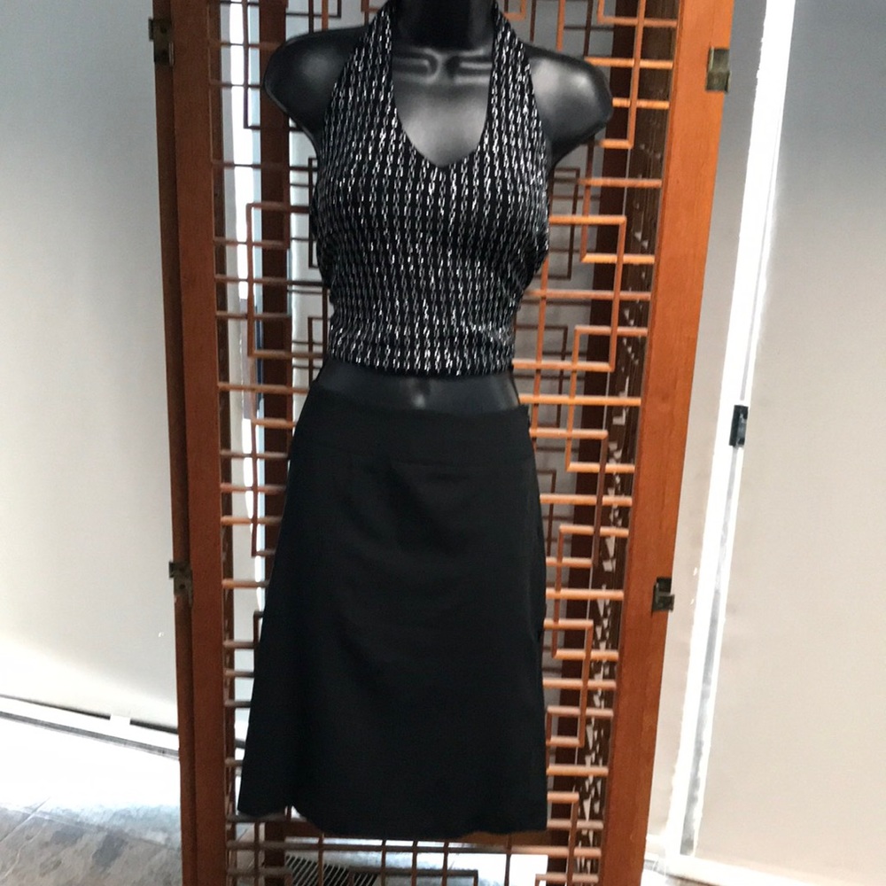Ann Taylor Loft Black size 12 skirt with slits and side zipper.